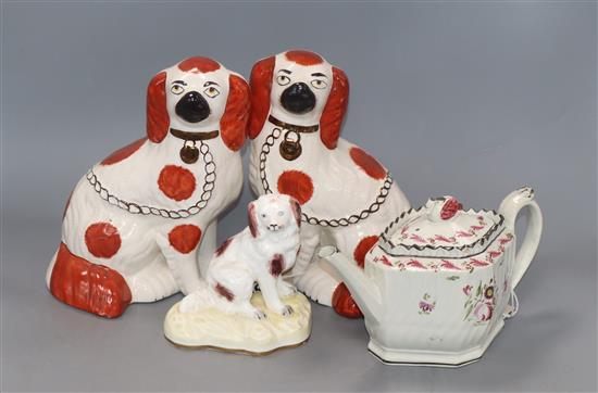 A Samuel Alcock spaniel, a Thomas Harley pearlware teapot and a pair of Staffordshire spaniels